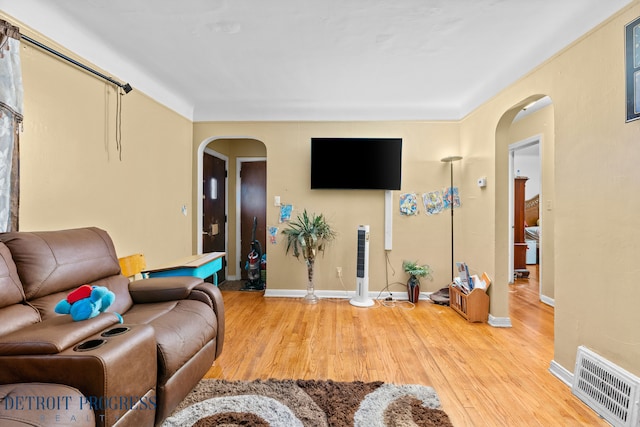 living room featuring light wood-type flooring