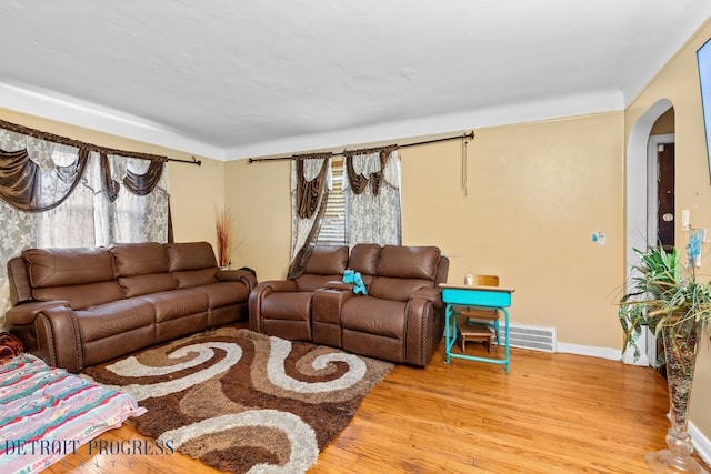 living room with hardwood / wood-style flooring