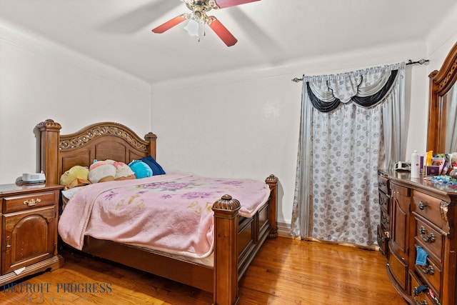 bedroom featuring ceiling fan and light wood-type flooring