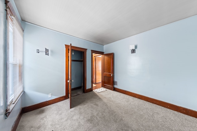 unfurnished bedroom featuring carpet flooring