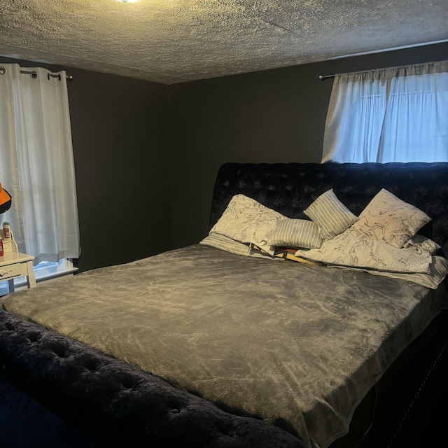 bedroom with a textured ceiling