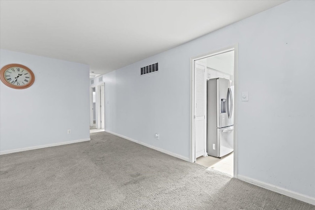 empty room with light carpet