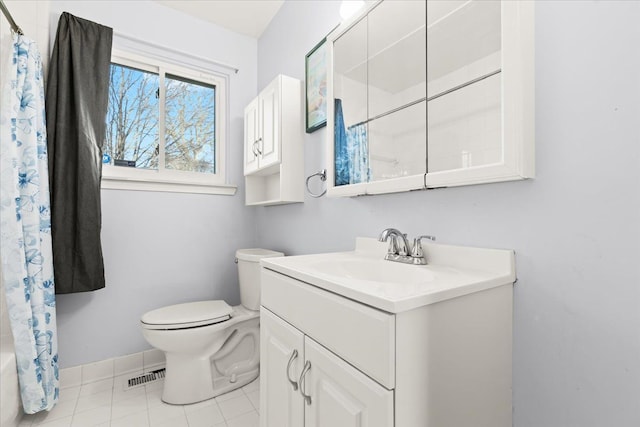 full bathroom with toilet, vanity, shower / bath combo, and tile patterned flooring