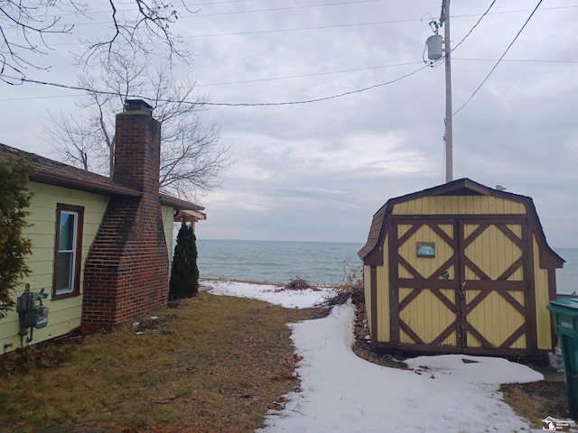 property view of water featuring a beach view