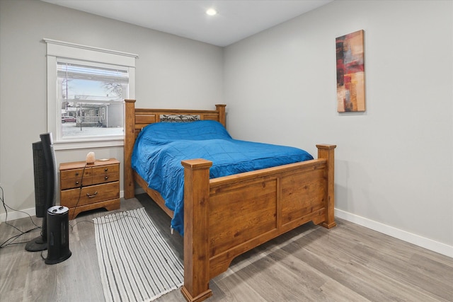 bedroom with light wood-type flooring