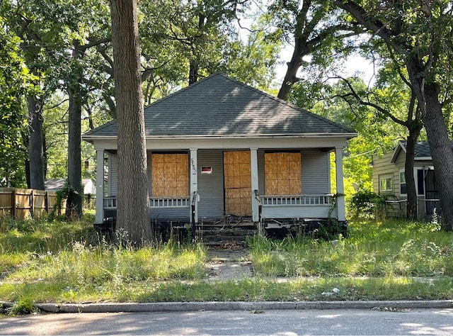 bungalow-style home with a porch