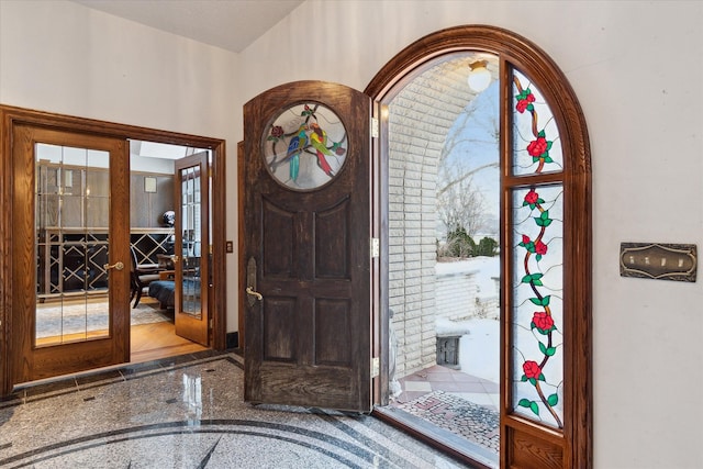 foyer entrance featuring french doors