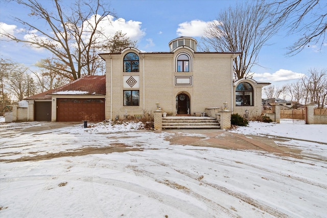 view of front of home with a garage