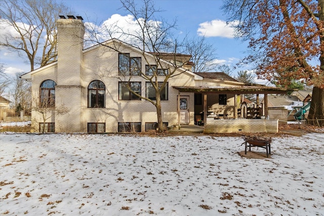 view of snow covered property