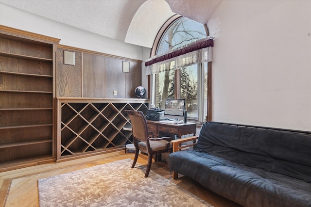 wine cellar with a textured ceiling