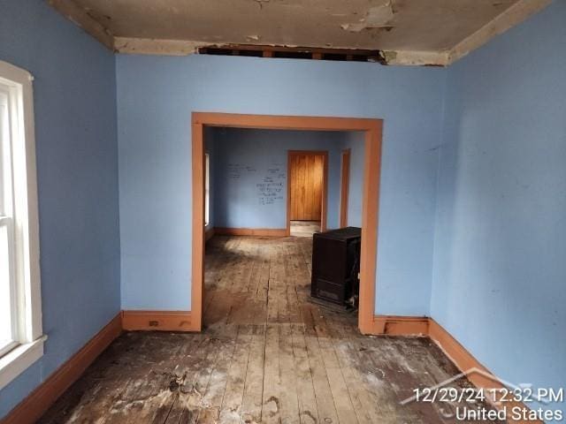 spare room featuring dark hardwood / wood-style flooring