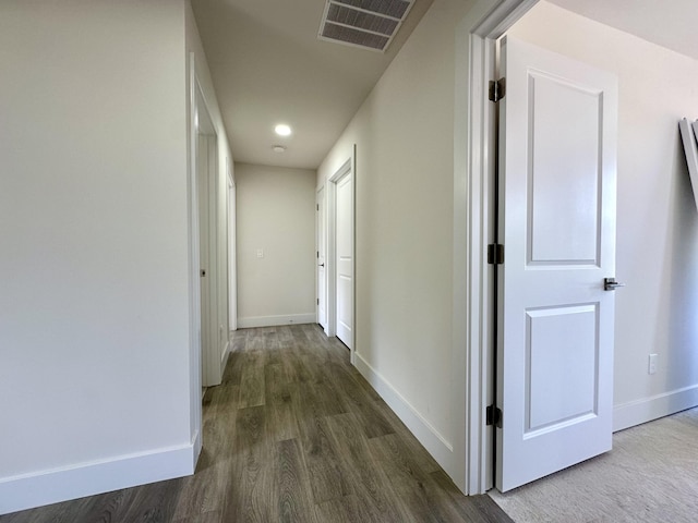 2011 Green Acres Dr, Adrian, MI 49221 - hall featuring dark wood finished floors and recessed lighting