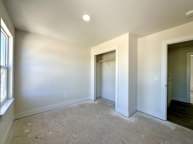 2011 Green Acres Dr, Adrian, MI 49221 - unfurnished bedroom with a closet and recessed lighting