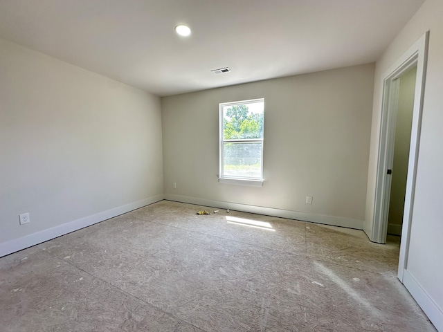 2011 Green Acres Dr, Adrian, MI 49221 - unfurnished room featuring baseboards and recessed lighting