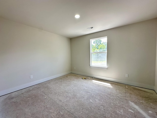 2011 Green Acres Dr, Adrian, MI 49221 - unfurnished room with baseboards and recessed lighting