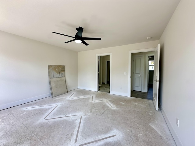 2011 Green Acres Dr, Adrian, MI 49221 - unfurnished bedroom with baseboards and a ceiling fan