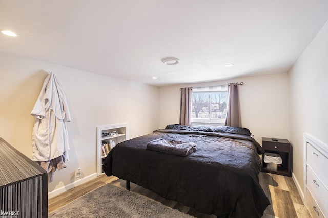 bedroom featuring light hardwood / wood-style floors