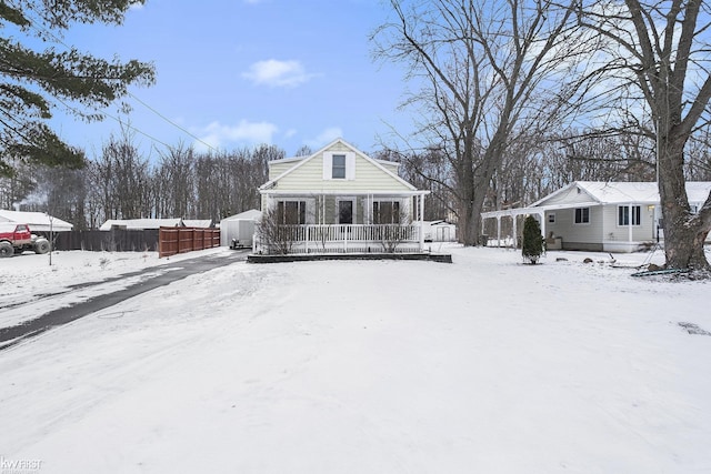 view of front of property featuring covered porch