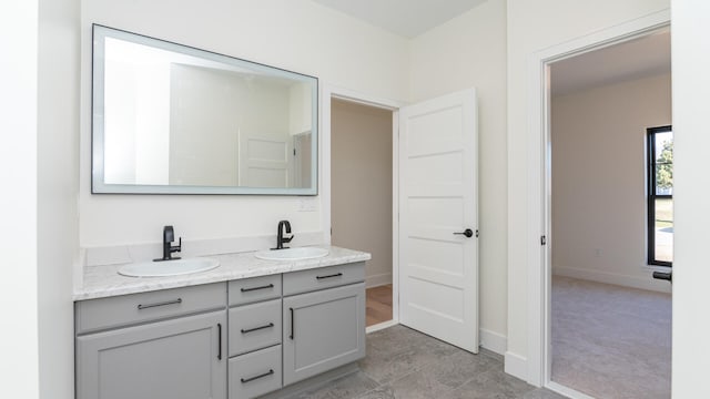 332 Arbor Ln, Saline, MI 48176 - full bathroom featuring double vanity and baseboards