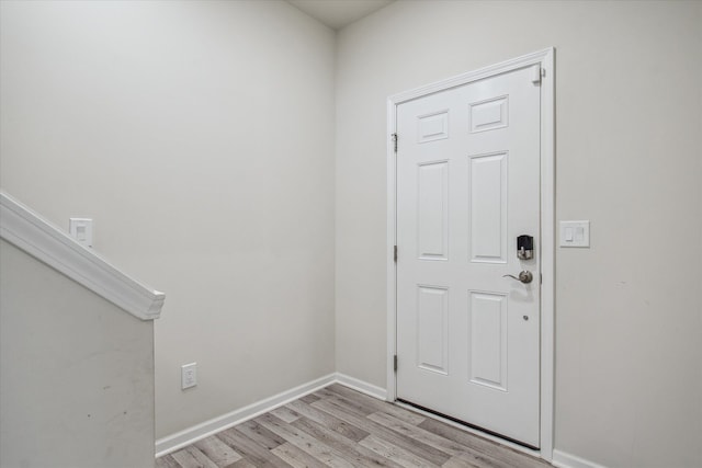 entrance foyer with light hardwood / wood-style flooring