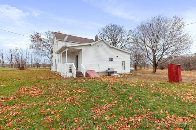 view of home's exterior featuring a yard