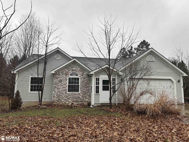 ranch-style house with a garage