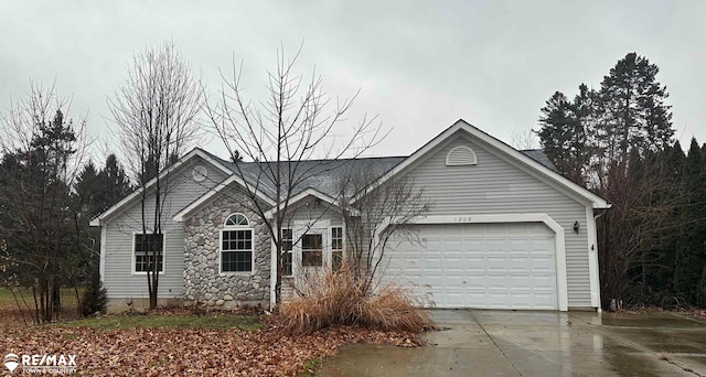 single story home featuring a garage