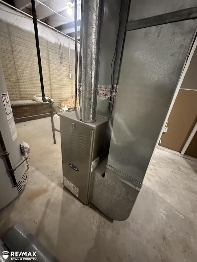 utility room with water heater