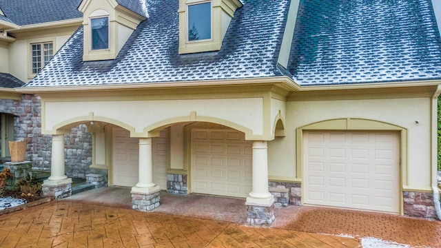 exterior space with a garage