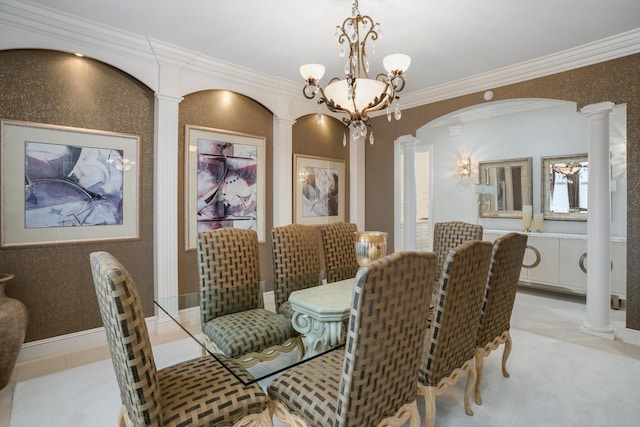 tiled dining area with ornate columns, a chandelier, and crown molding