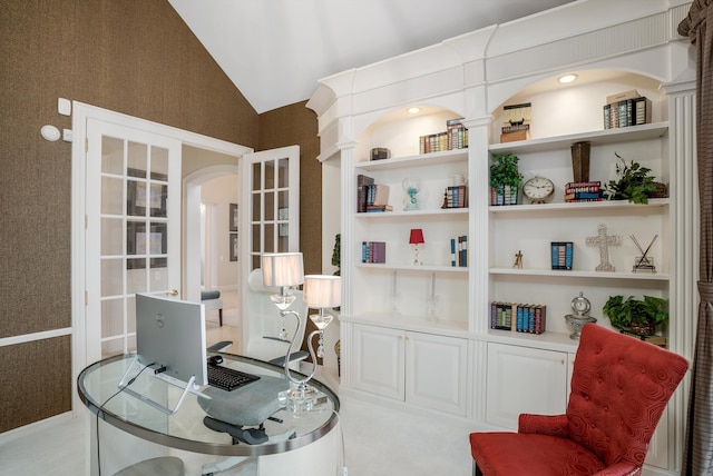 office with lofted ceiling and french doors