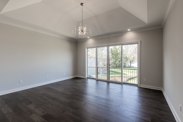 4380 The Heights Blvd, Rochester, MI 48306 - spare room with a tray ceiling, dark hardwood / wood-style flooring, ornamental molding, and a notable chandelier
