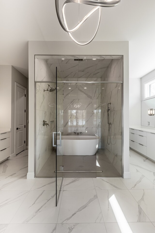 4380 The Heights Blvd, Rochester, MI 48306 - bathroom with vanity and shower with separate bathtub
