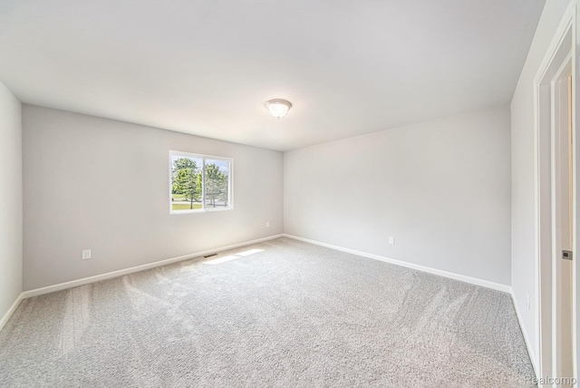 172 Woodland Way, Manchester, MI 48158 - empty room featuring carpet flooring and baseboards