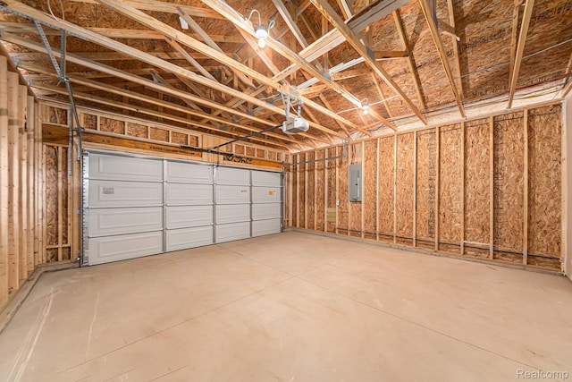 172 Woodland Way, Manchester, MI 48158 - garage featuring a garage door opener and electric panel