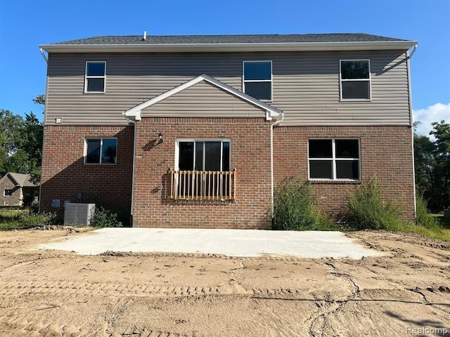 rear view of house featuring a patio area