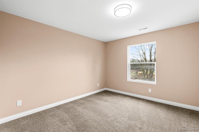 view of carpeted spare room