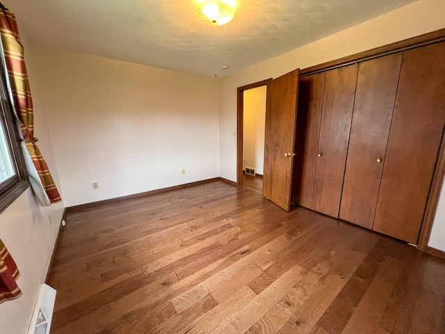 unfurnished bedroom featuring light hardwood / wood-style floors