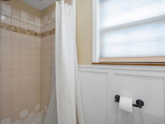 bathroom with a shower with shower curtain