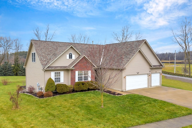 view of front of home featuring a garage and a front yard