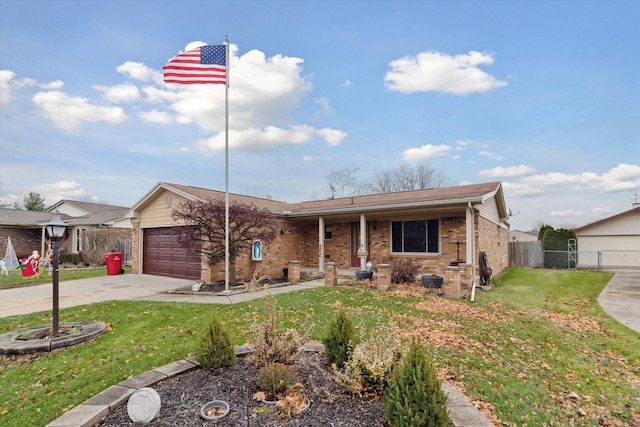 view of front facade featuring a front lawn and a garage