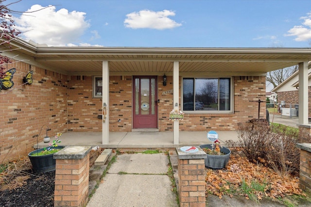 entrance to property with covered porch