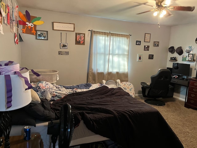 bedroom with ceiling fan and carpet floors