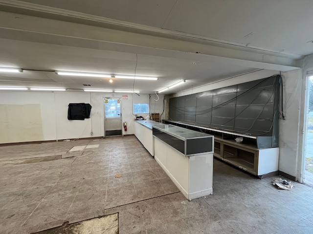 interior space with white cabinetry