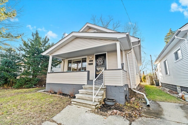 bungalow with a front lawn