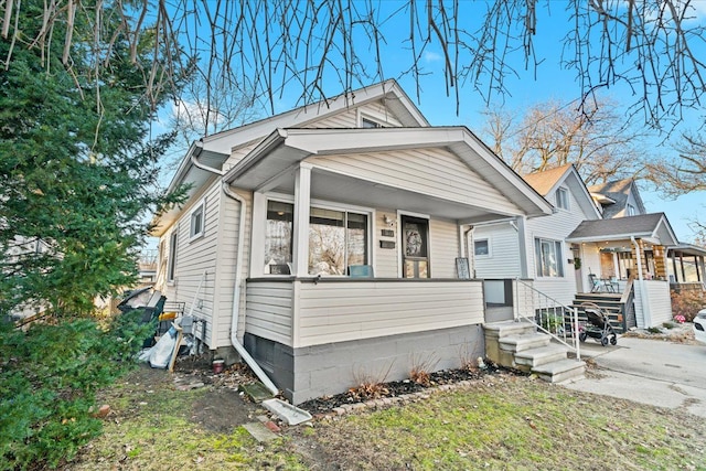 bungalow-style home with covered porch