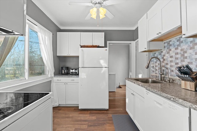 kitchen featuring white cabinetry, white appliances, and sink