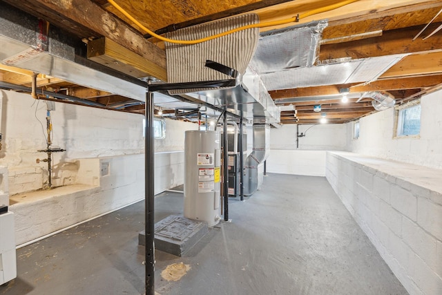 basement with heating unit and water heater