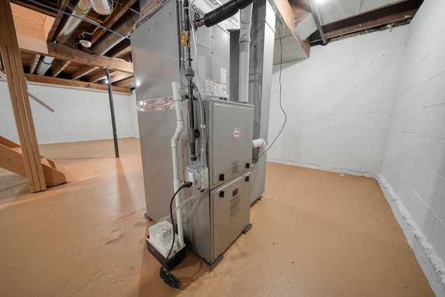 utility room featuring heating unit