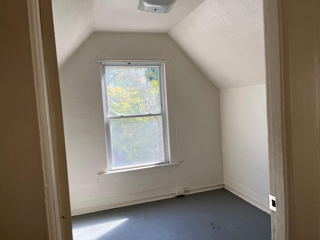 bonus room featuring vaulted ceiling